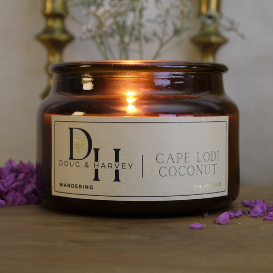 Candle with a label on a blurred background