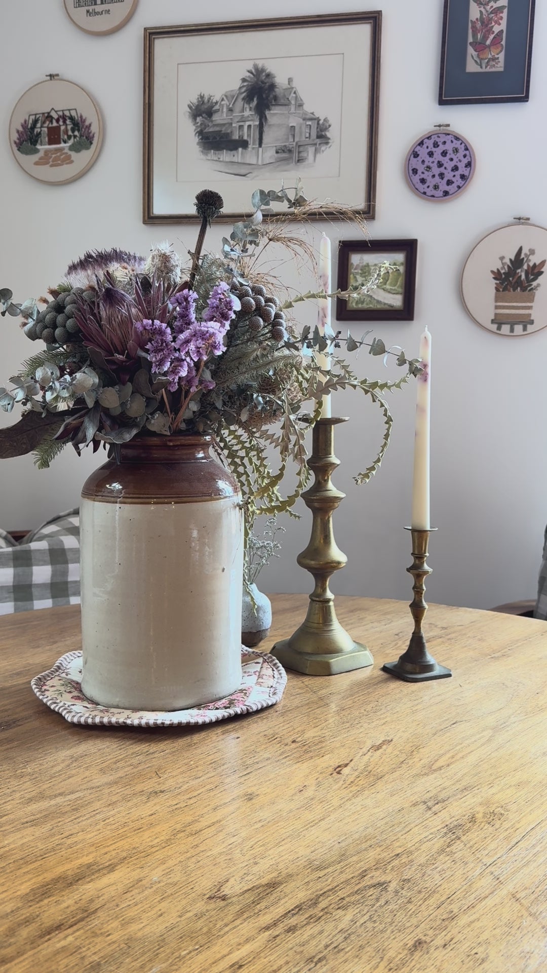 Inserting rattan reeds into seymour cedarwood natural reed diffuser with country table backdrop
