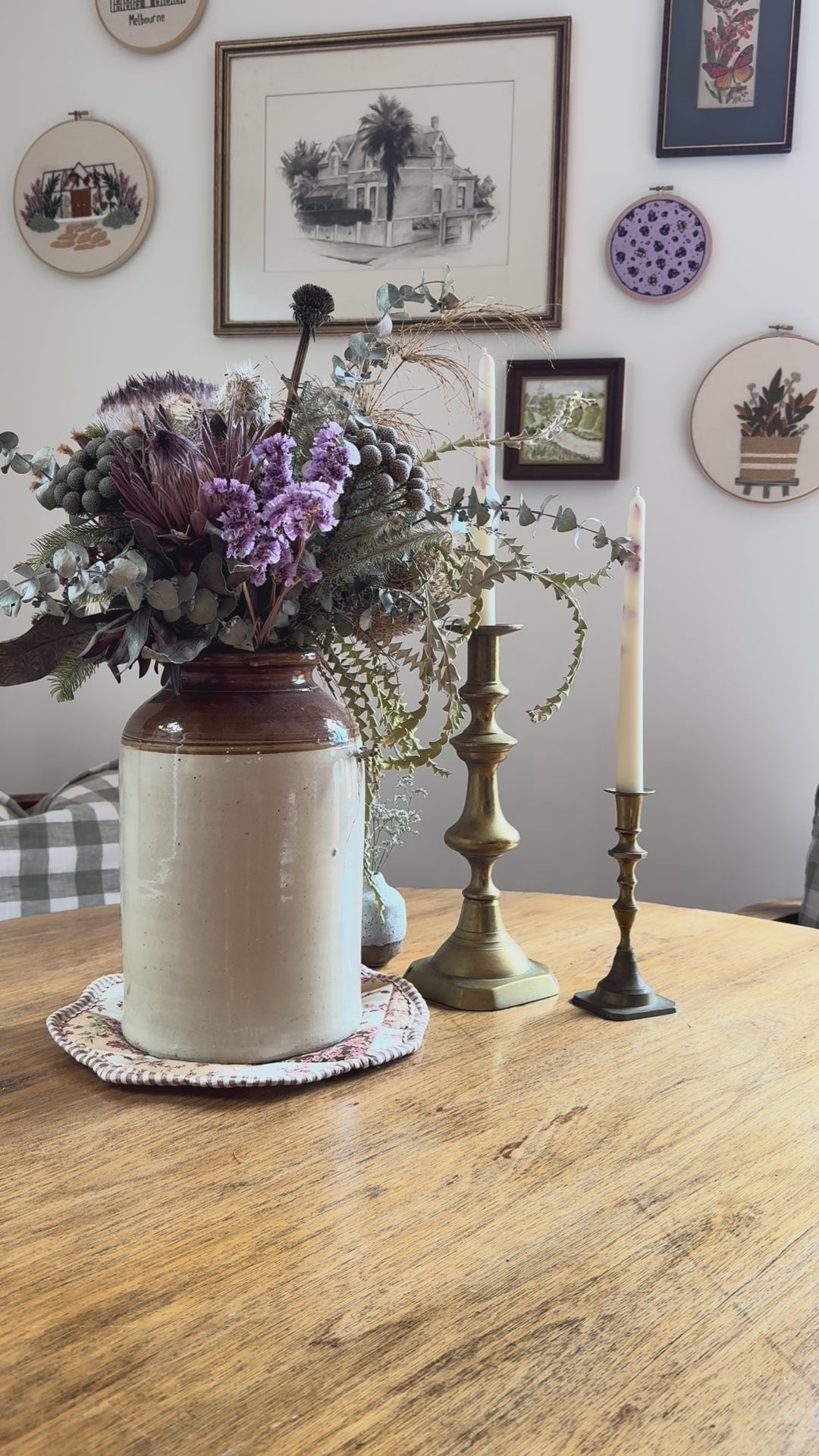 inserting rattan reeds into pear natural reed diffuser with country setting